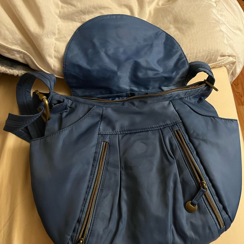 travelonFront Zip Hobo Bag beautiful blue with paisley lining.